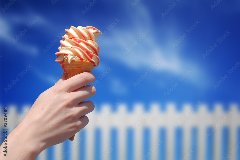 A lady holding a icecream