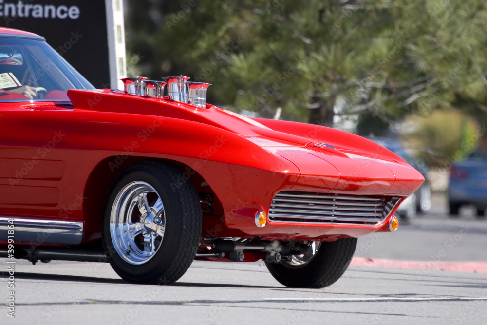 classic car close-up on hood with  large engine