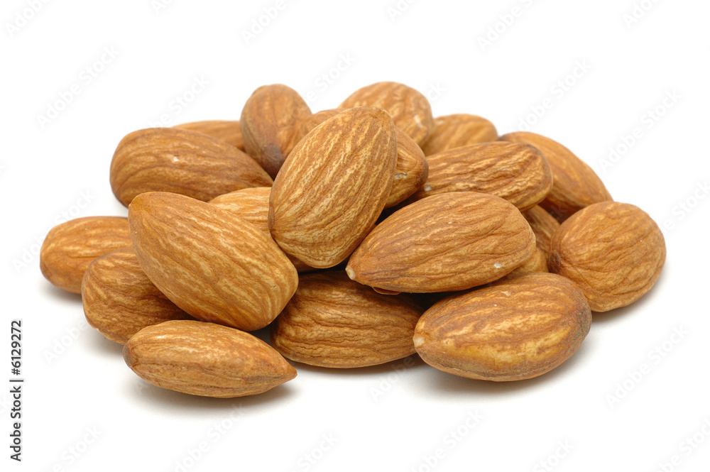 Pile of almonds in isolated white background