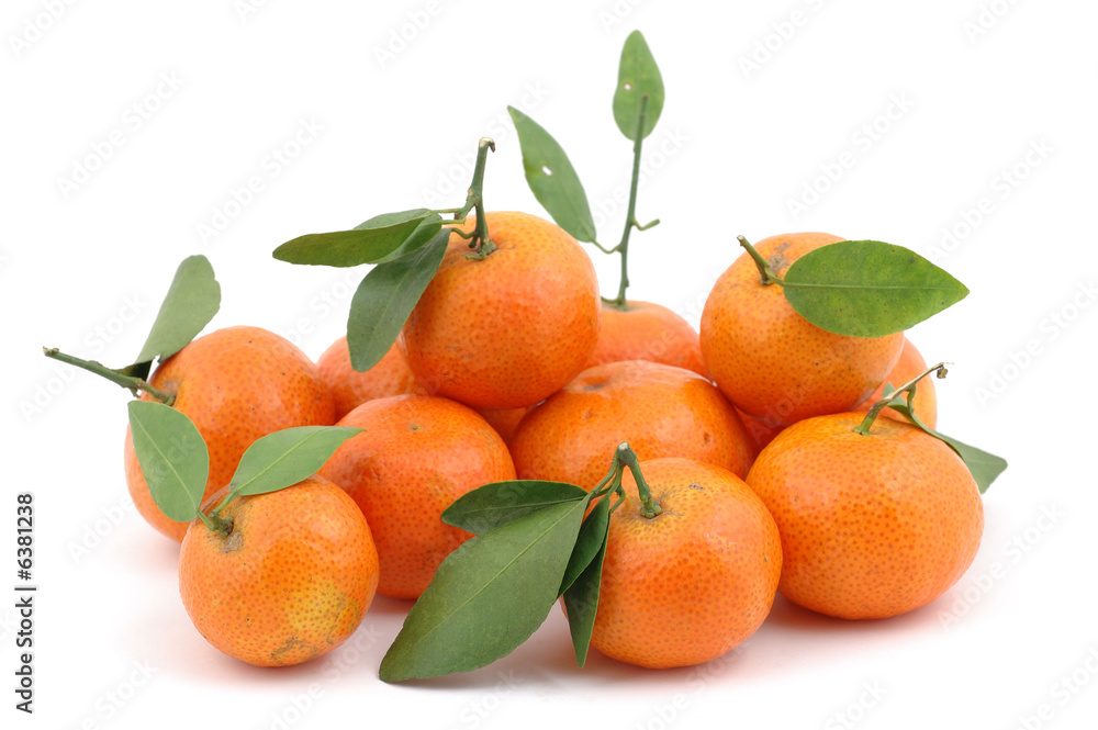 Pile of fresh tangerines in isolated white background