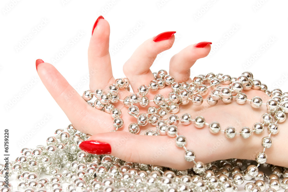 Woman hand with silver glassbeads