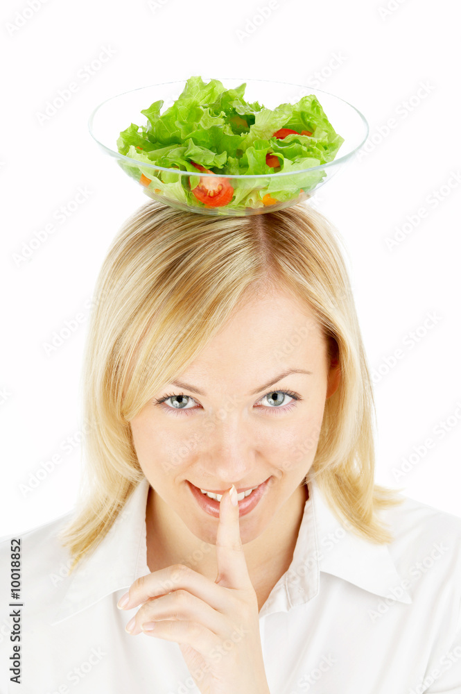 The blonde holds salad on a head