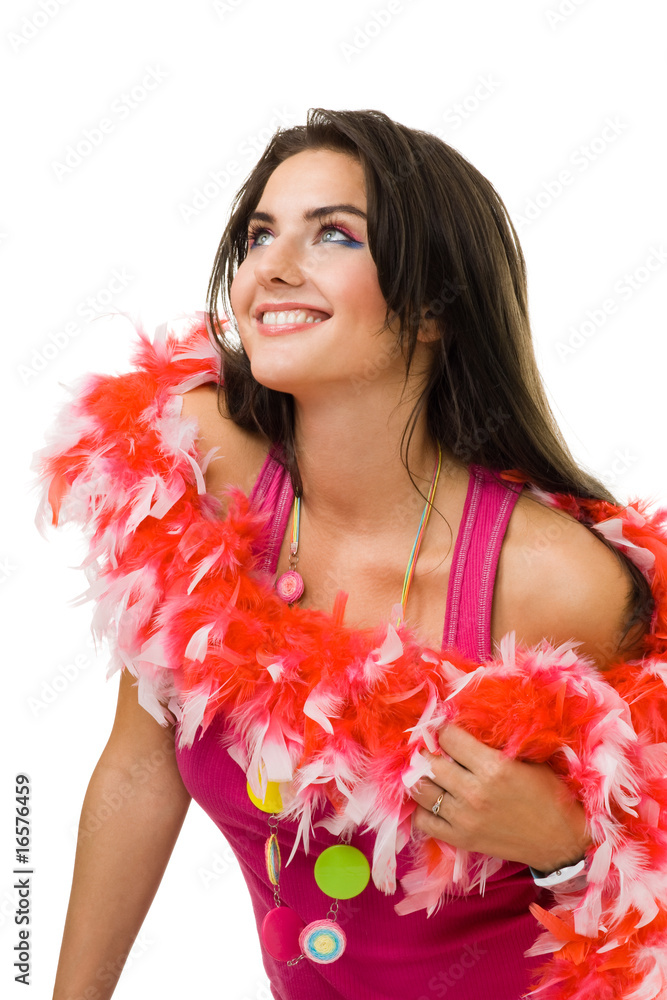 Young woman sitting with red feather