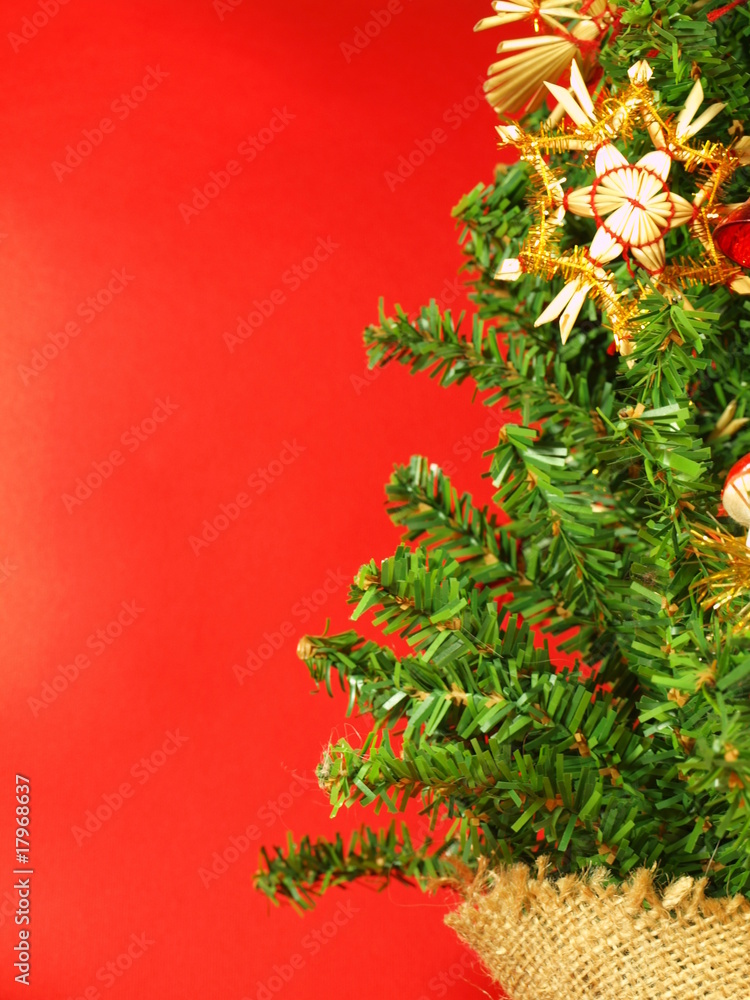 Christmas tree on red background