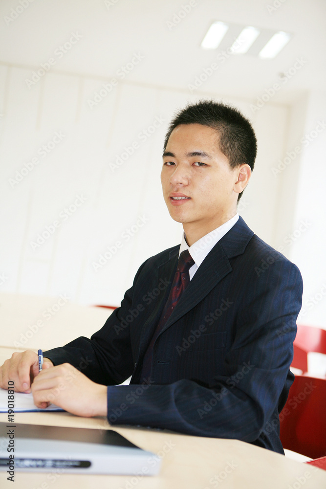 young asian businessman in office