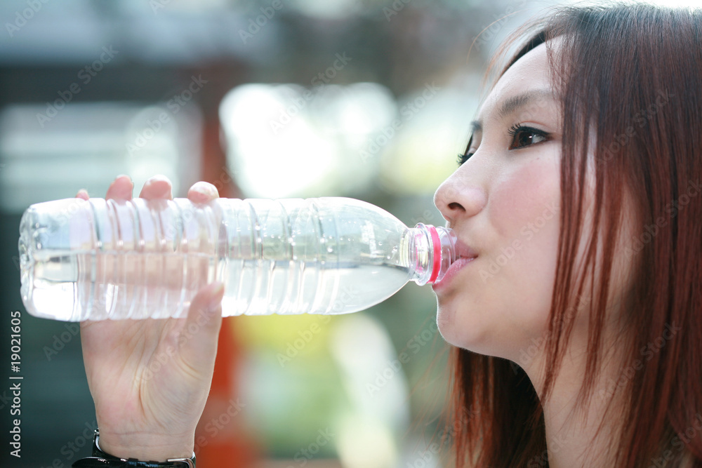 young asian women drinking water