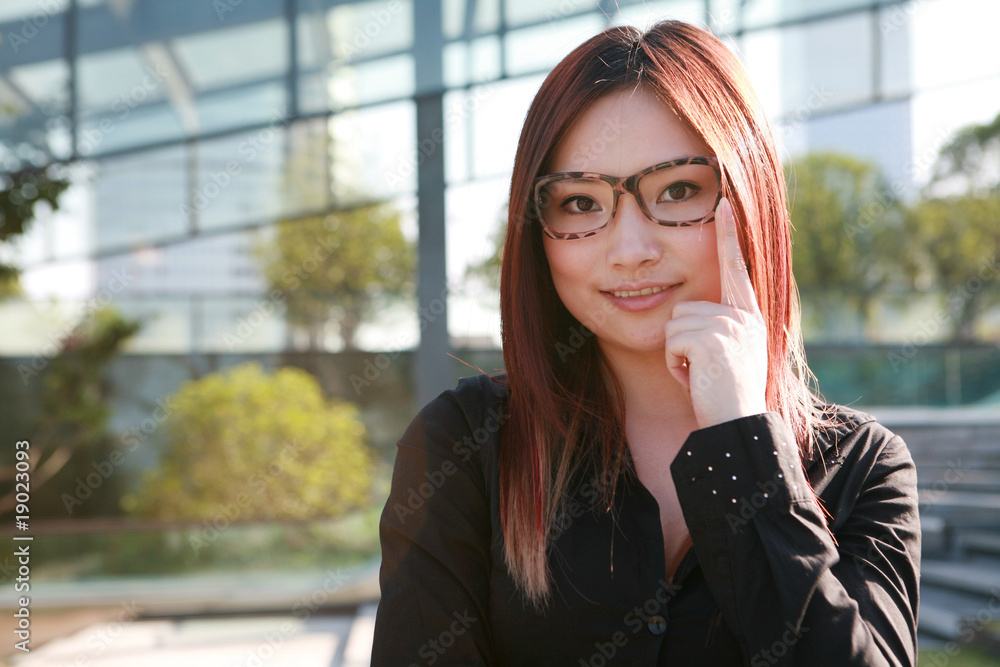 young asian business women look at camera