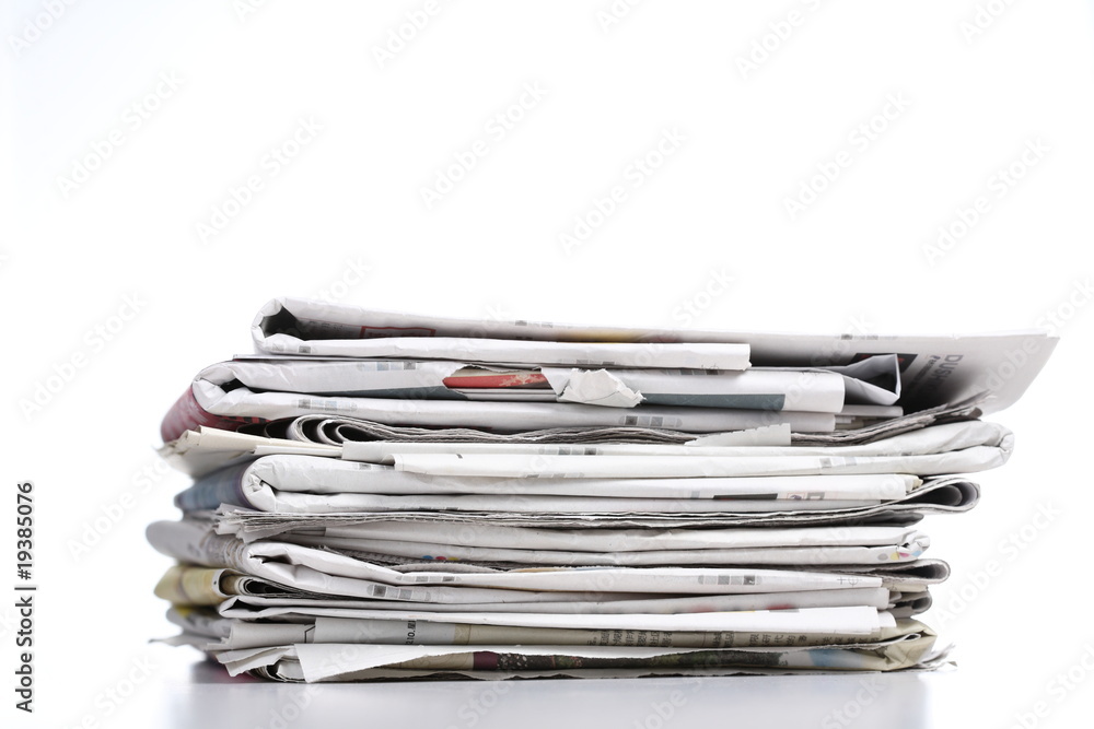 pile of newspaper with white background