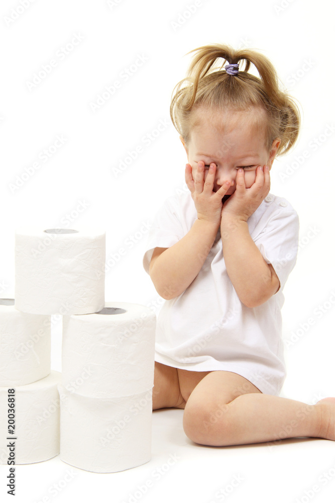 Baby girl with toilet paper