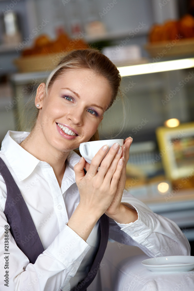 The beautiful girl in cafe