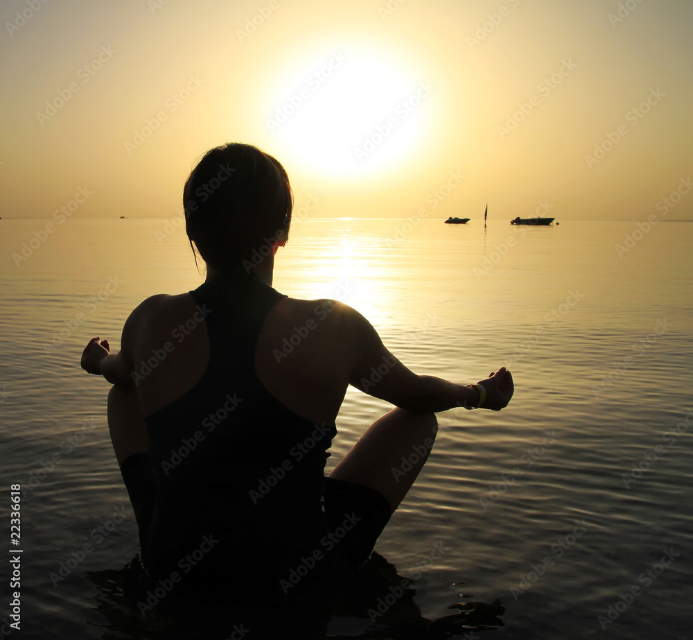 Meditation on Red Sea at sunrise