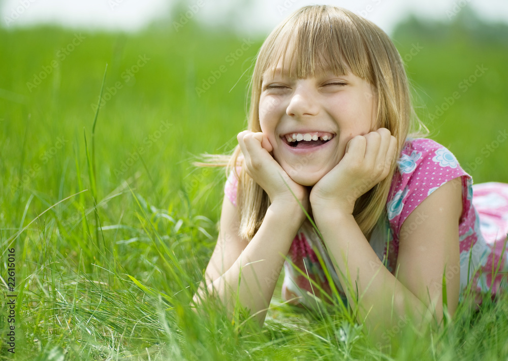 Happy Little Girl in a park