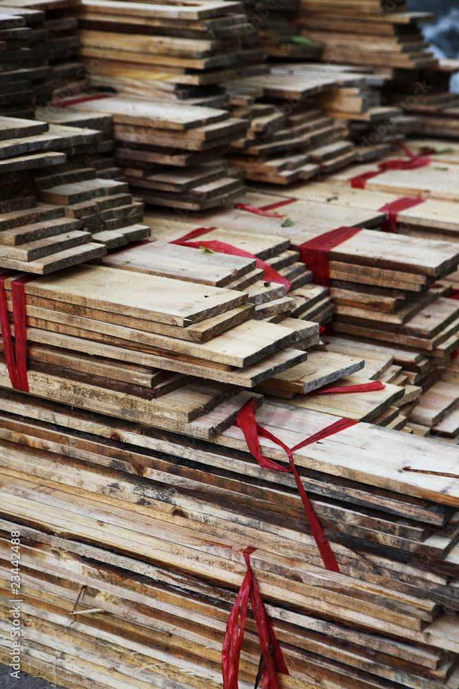 sawed wooden boards laid in a heap