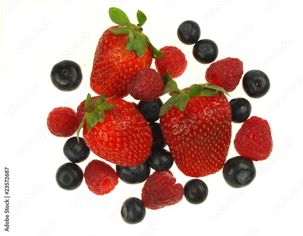 Raspberries,strawberries and blueberries on white background