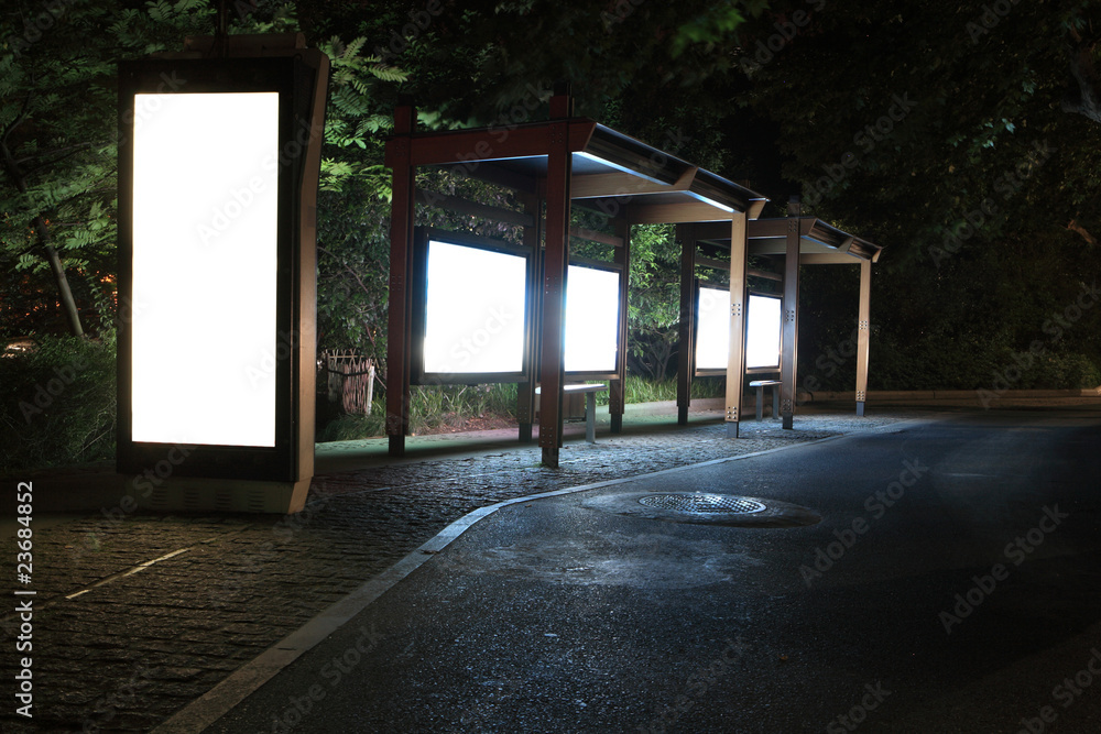 it is a advertisement blank in a modern Bus station