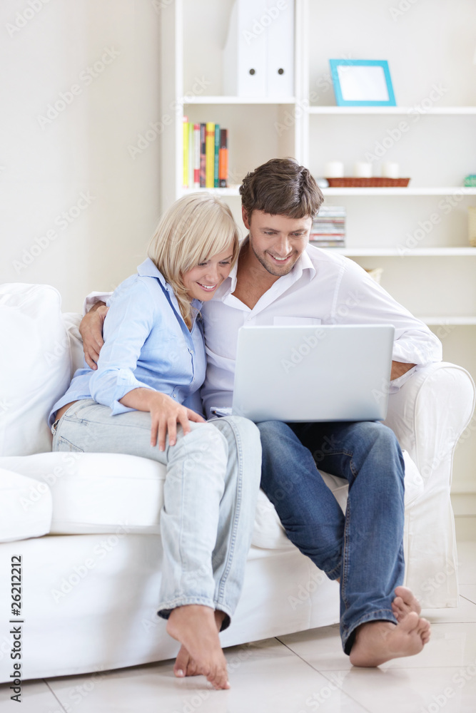 Smiling couple at home