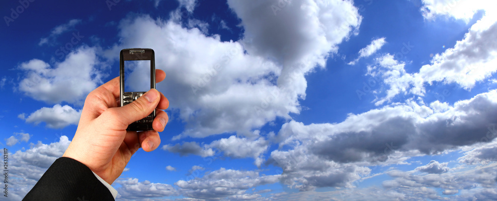 Businessman holding mobile phone