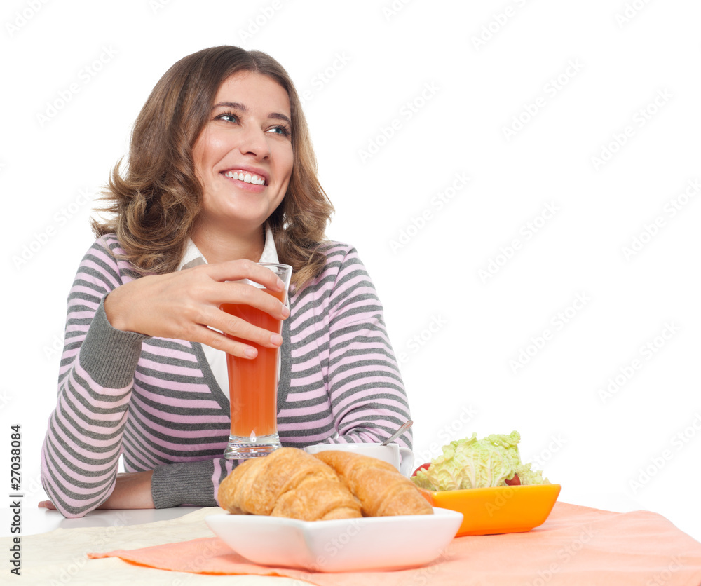 Happy woman having light breakfast