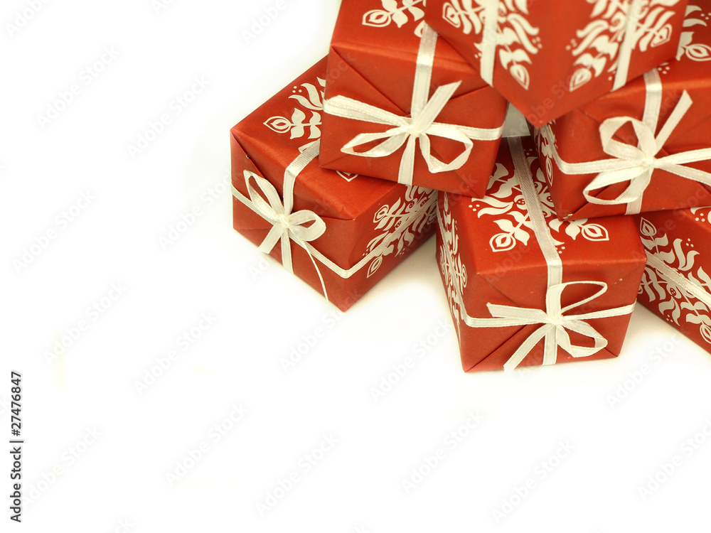 Red patterned gifts on white background