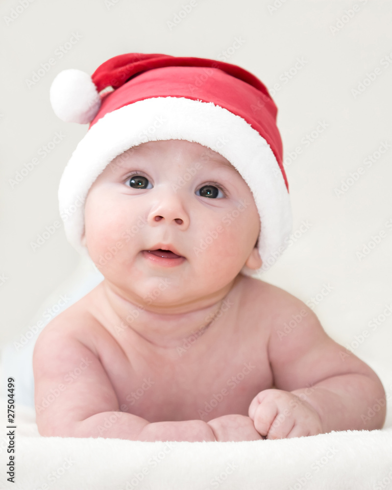 Cute baby boy in santa hat