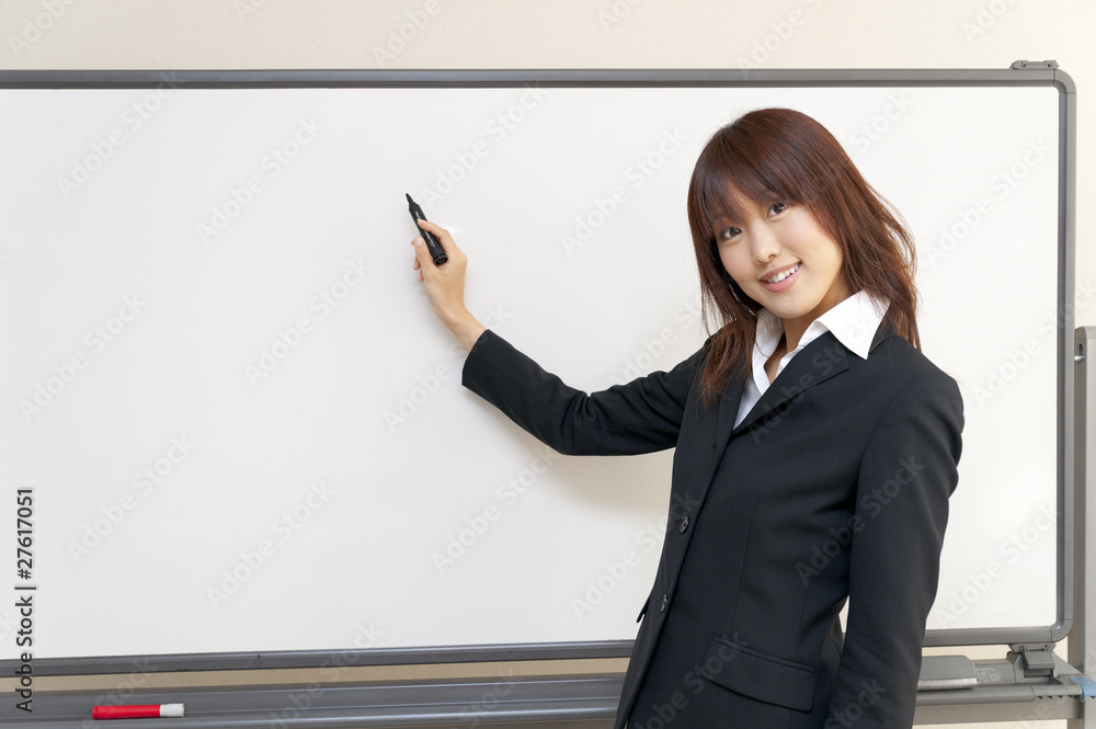 a portrait of young business woman with blank white board