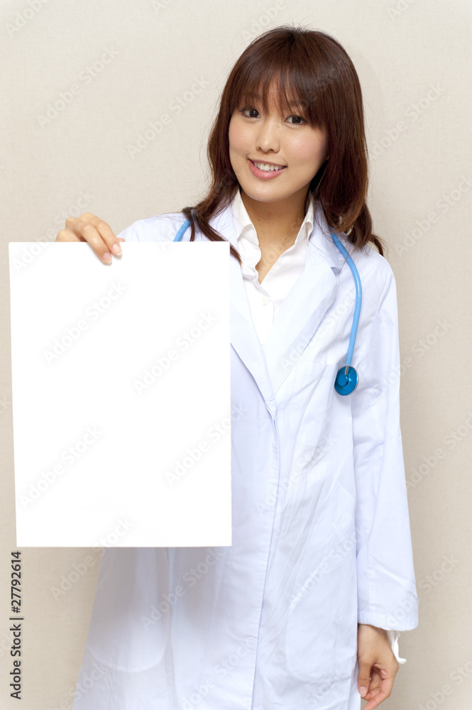 a portrait of young doctor taking a blank whiteboard