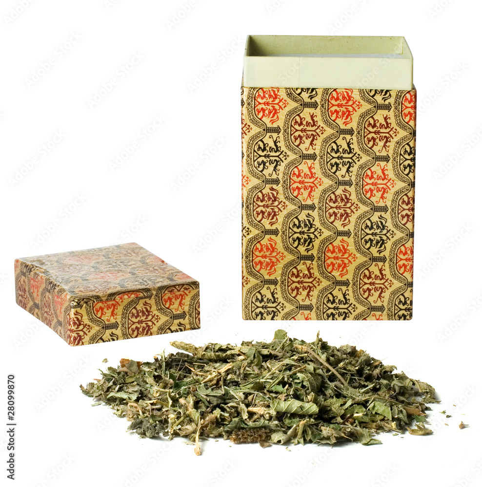 herbal tea near a beautiful box isolated on white