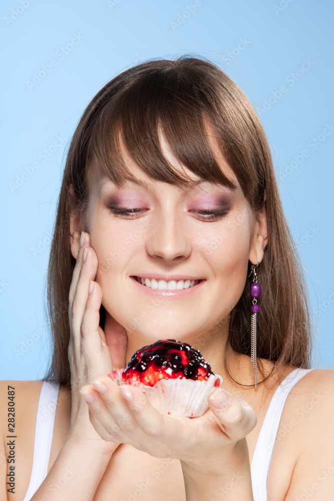 Pretty girl with cake