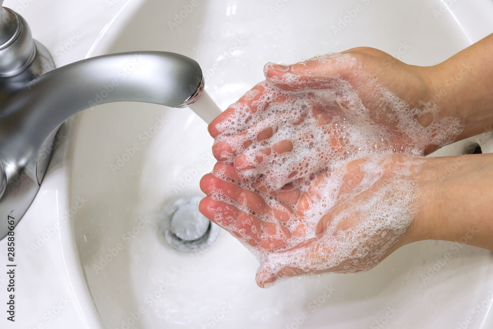 cleaning hands with soap