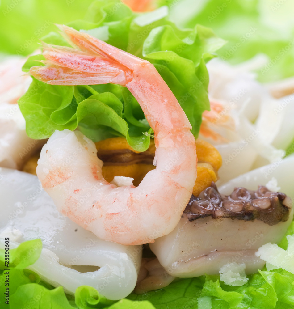 Healthy Seafood Salad with shrimps, octopus and mussels