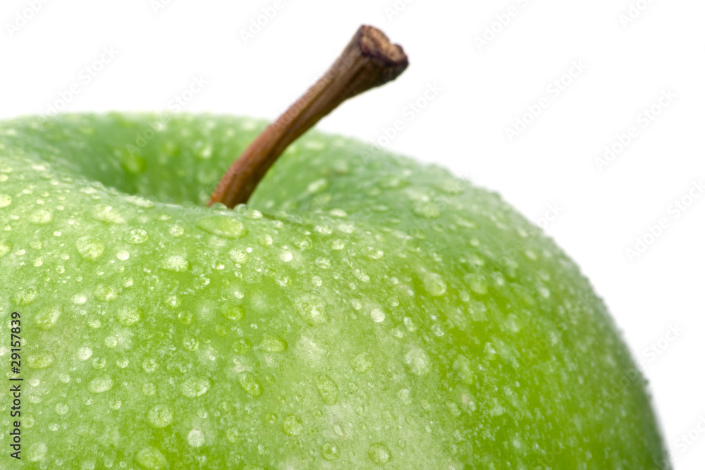 wet green apple isolated on white background. macro