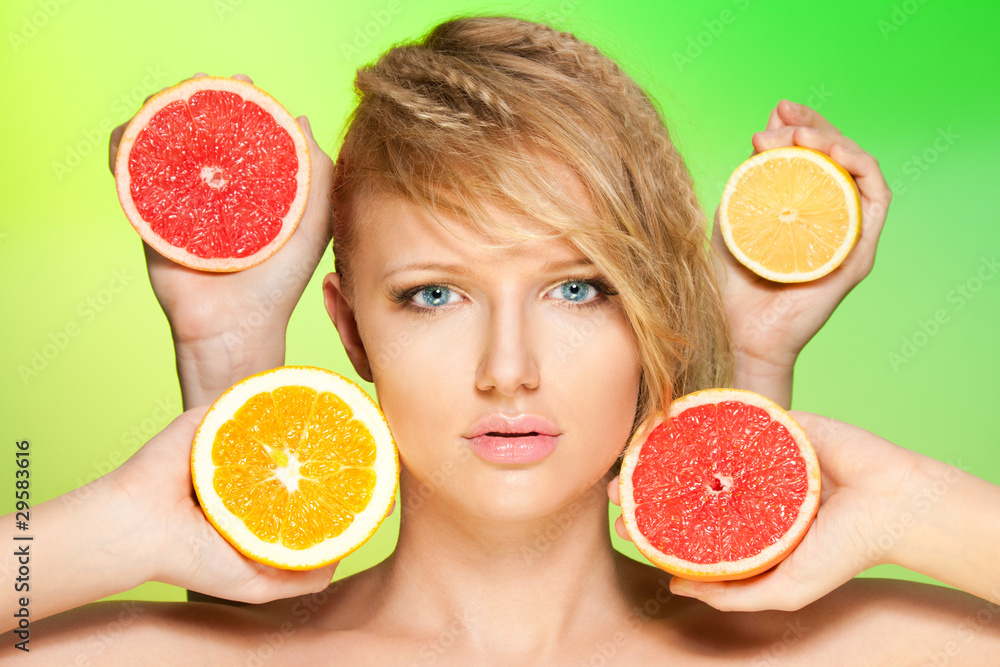 Portrait of woman with fruits