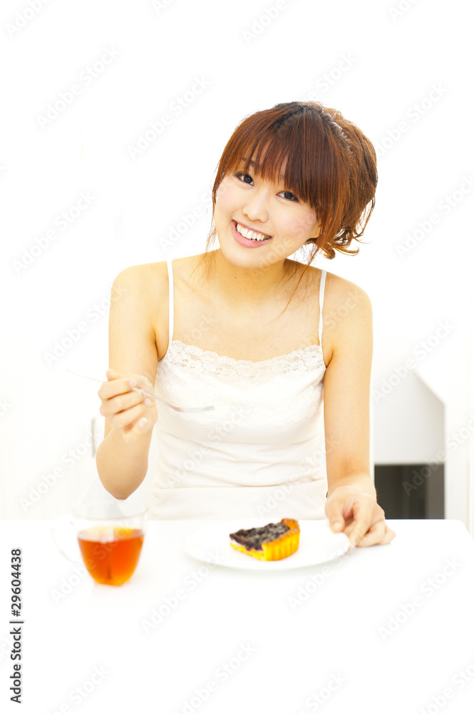 a portrait of beautiful asian woman eating a breakfast