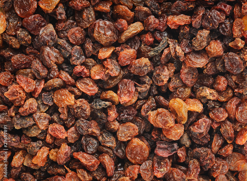 Dried red raisins, natural horizontal background