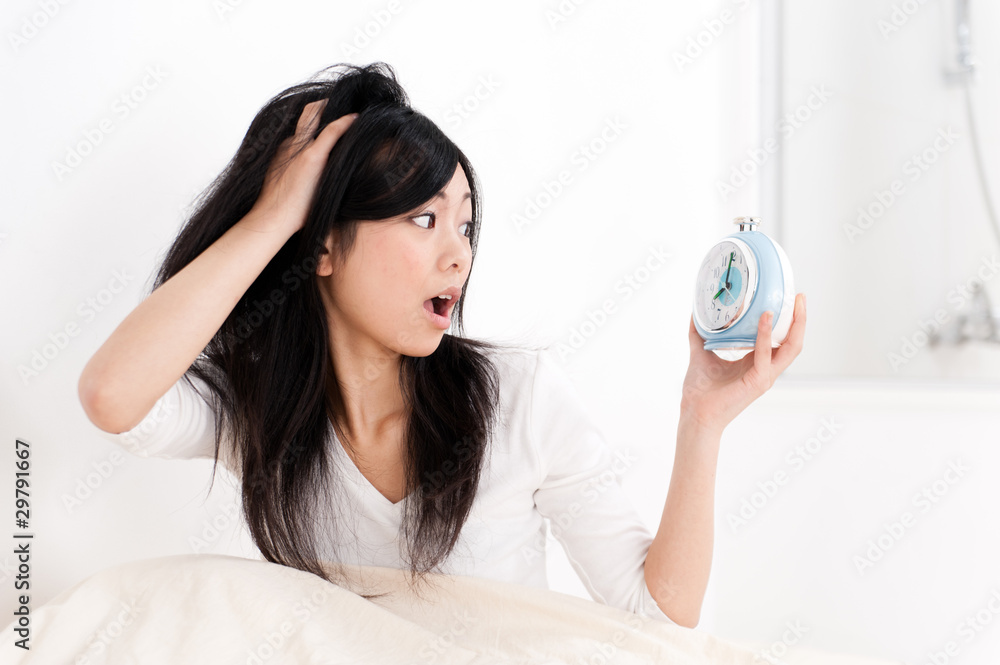 a portrait of beautiful asian woman on the bed