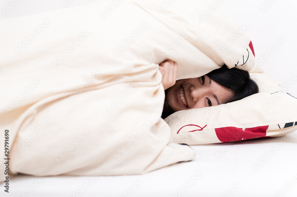 a portrait of beautiful asian woman on the bed