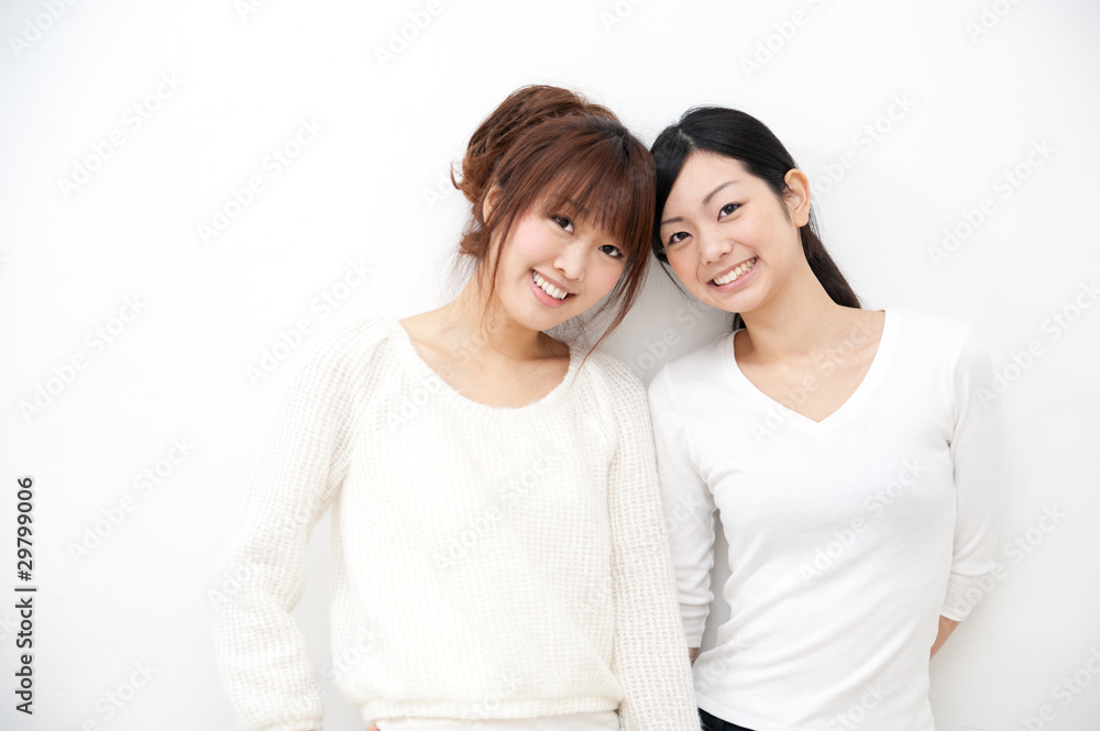 two beautiful asian women relaxing