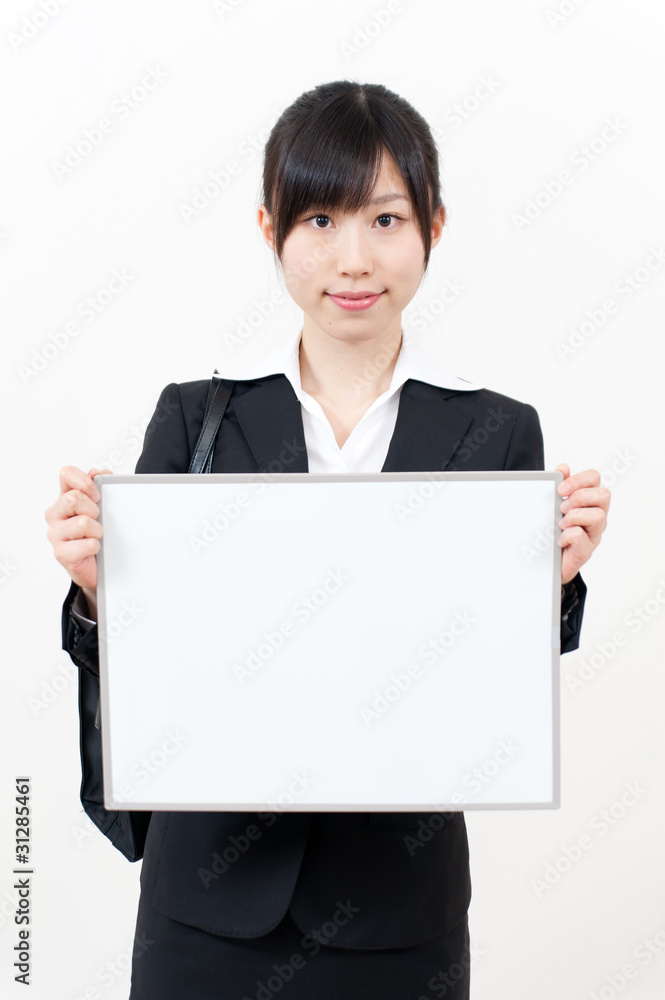 beautiful asian businesswoman with blank whiteboard