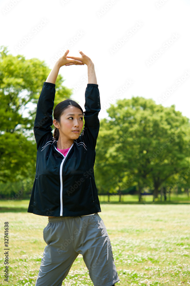 beautiful asian woman exercising in the park