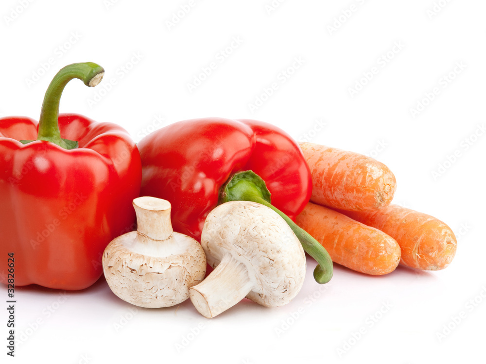 vegetarian food with peppers, carrots and mushrooms isolated