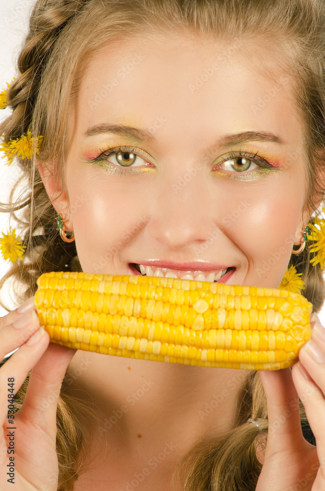 woman eating corn-cob