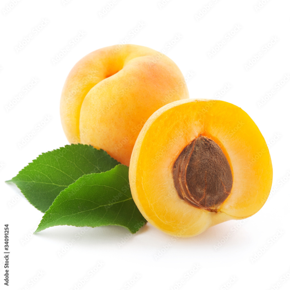 Apricot fruits with leaves isolated on white background