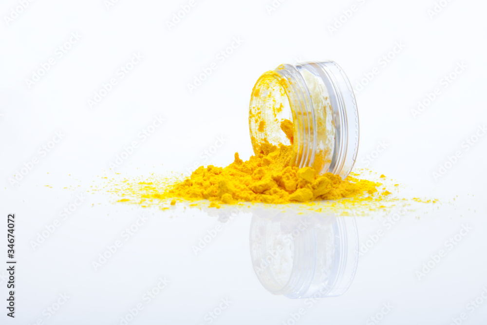 spilled yellow makeup powder