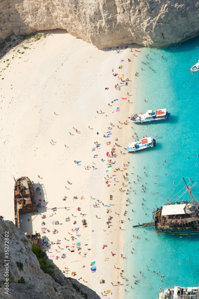 Top view of Navagio beach in Greece with cruisers