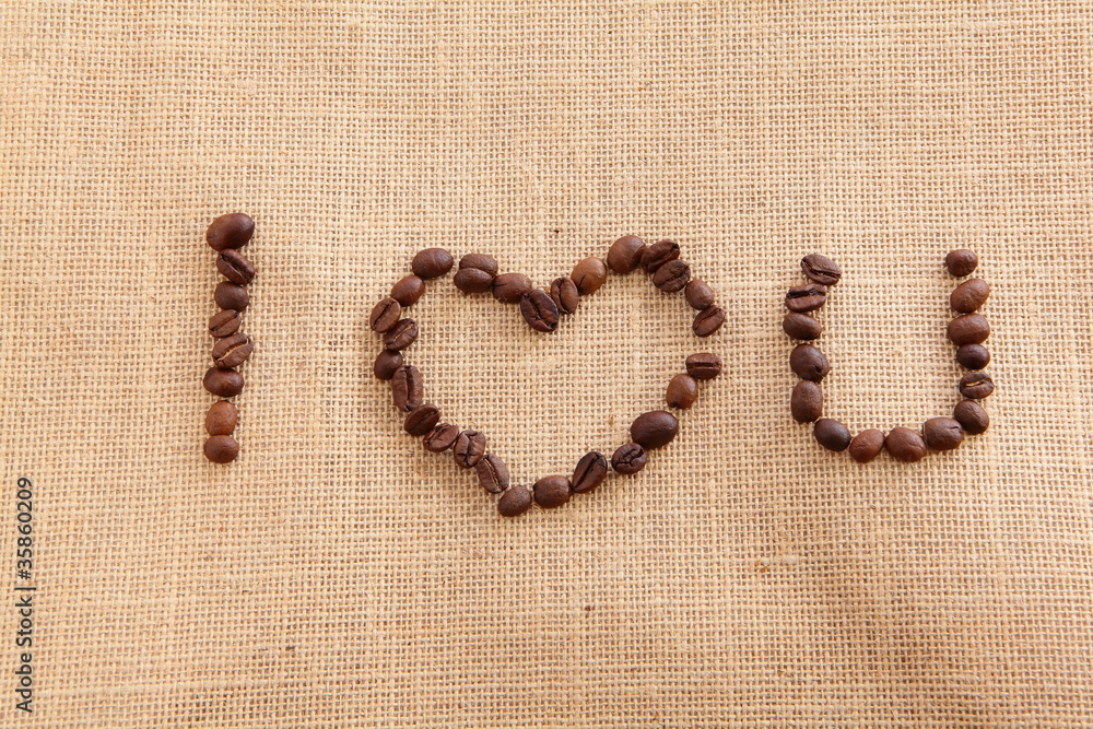 Coffee beans on linen background