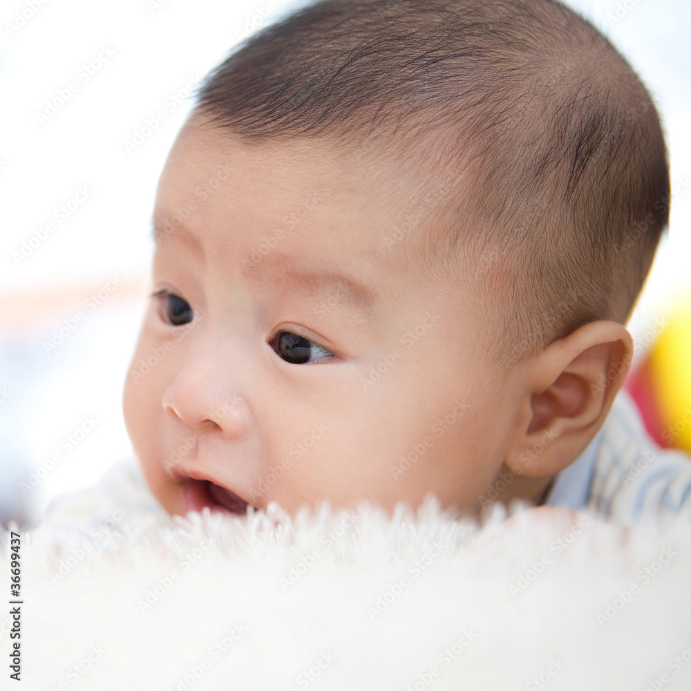 cute baby lie on bed