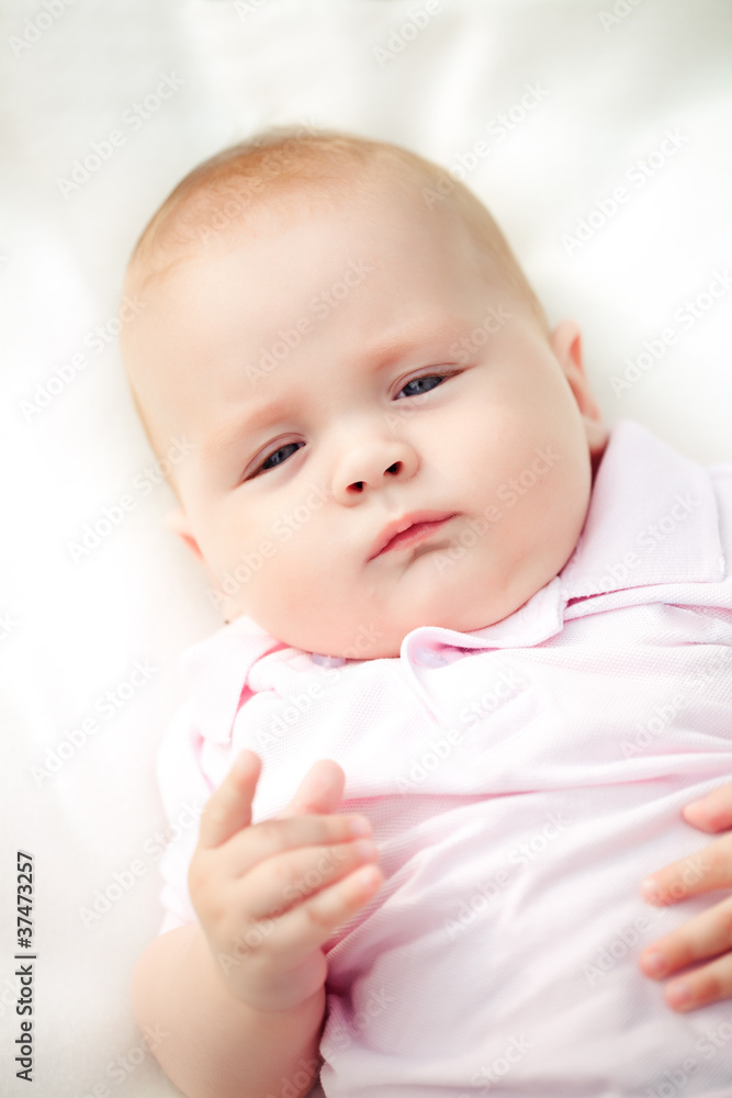 Baby laying on towel