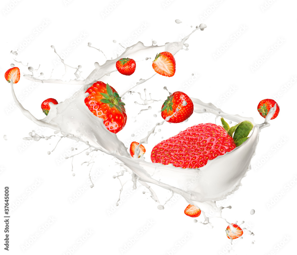 Strawberries in milk splash, isolated on white background