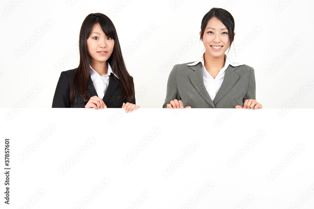 asian businesswomen with blank whiteboard