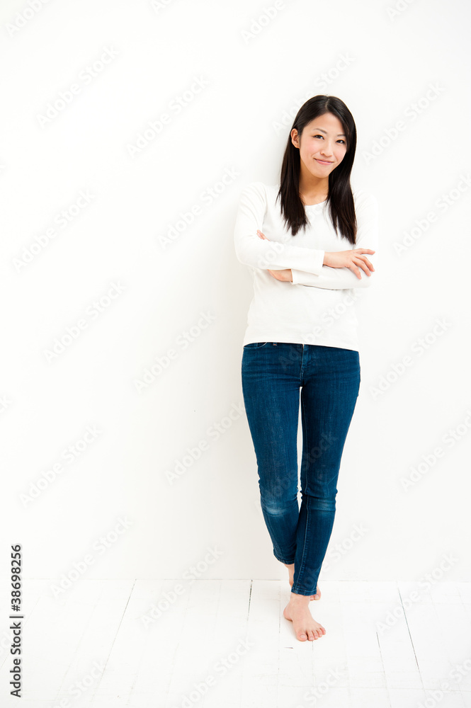 attractive asian woman relaxing in the white room